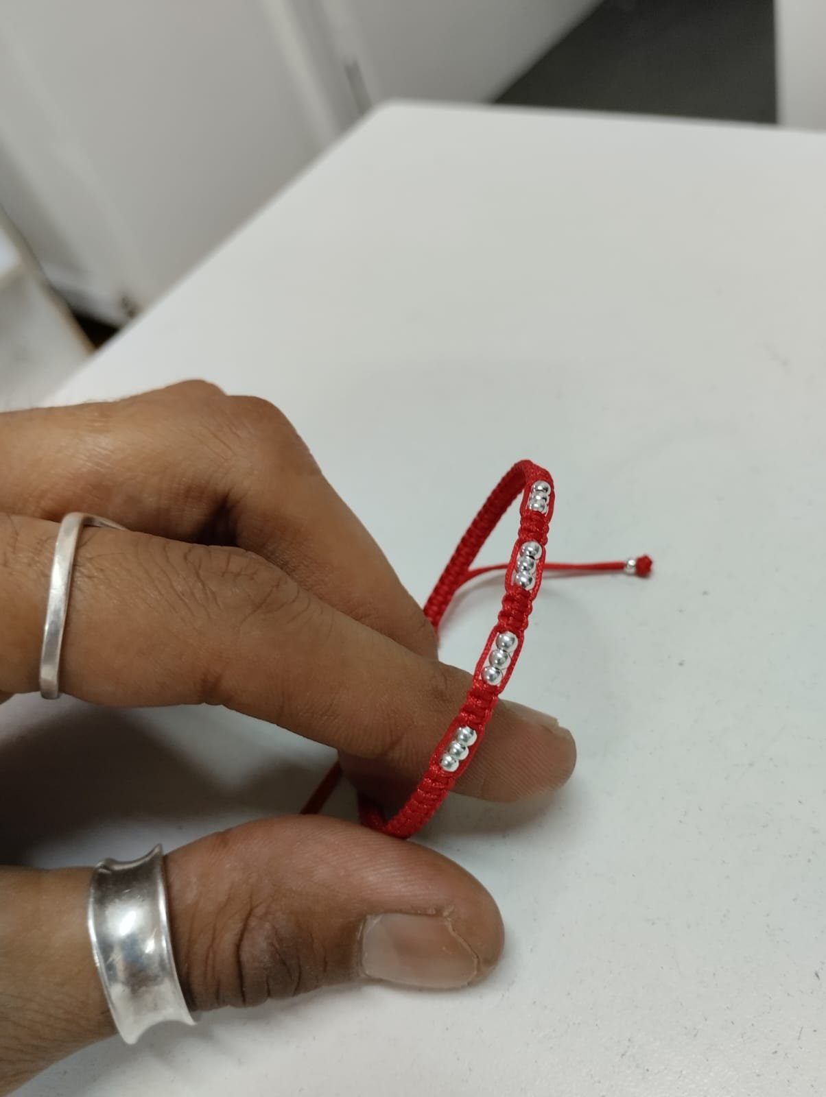 PULSERA HILO ROJO TRES BOLITAS C-26C