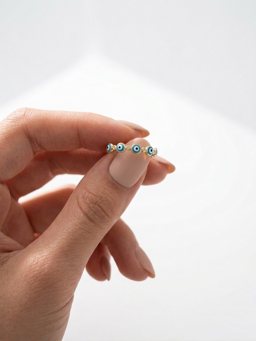 ANILLO OJITOS CON BRILLITOS DORADO C-38B